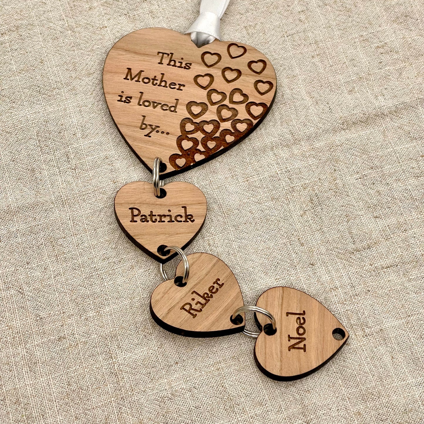 Cherry Wood Engraved Hanging Heart - Mother is loved by...