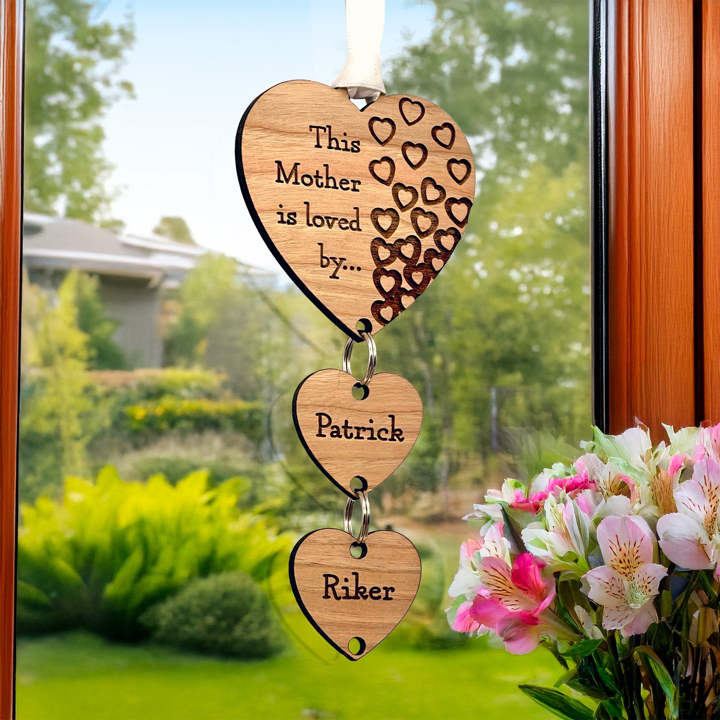 Cherry Wood Engraved Hanging Heart - Mother is loved by...