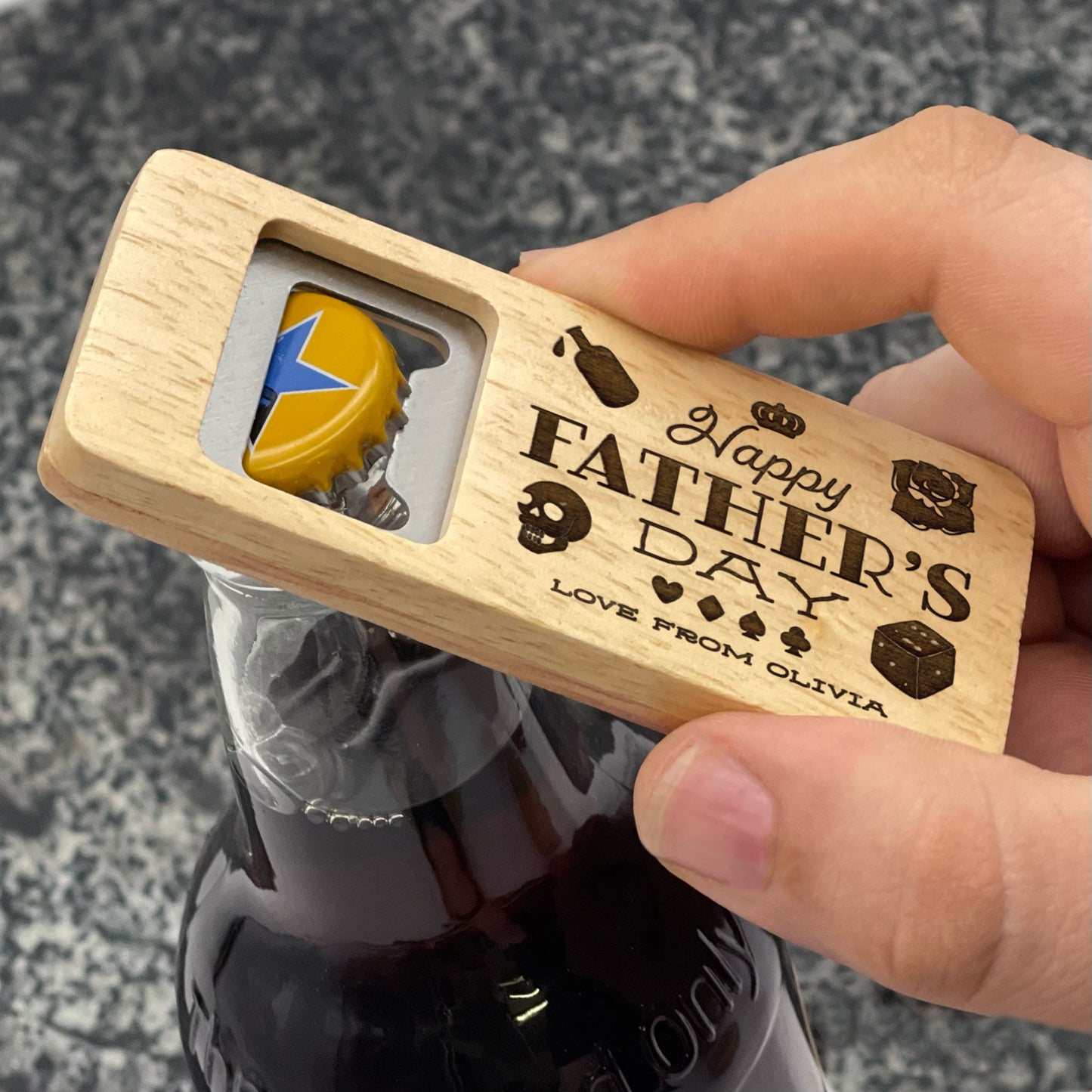 Father's Day Bottle Opener: Happy Father's Day. Pictured being used on a bottle of ale