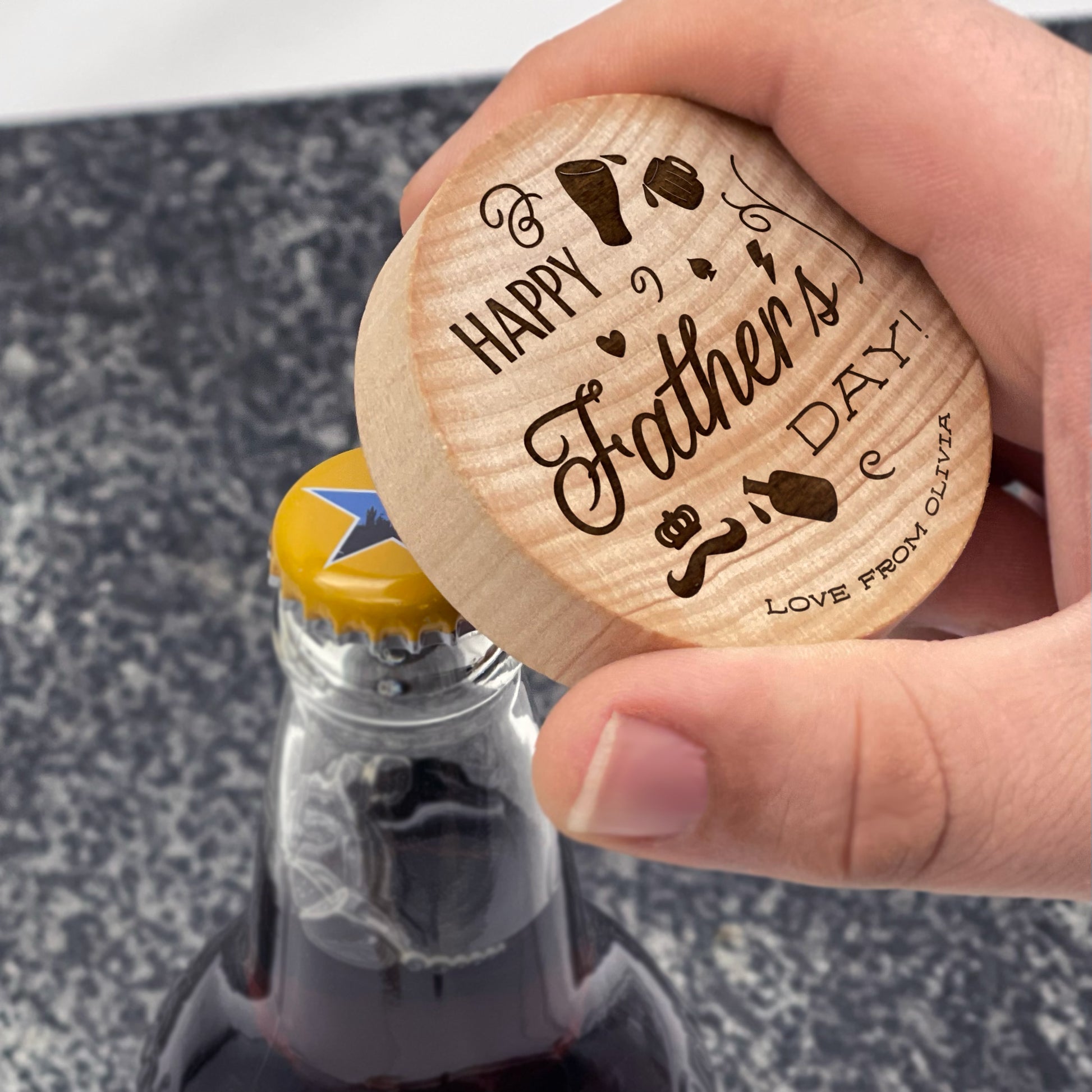 Father's Day Bottle Opener: Happy Father's Day. Pictured being used on a bottle of ale