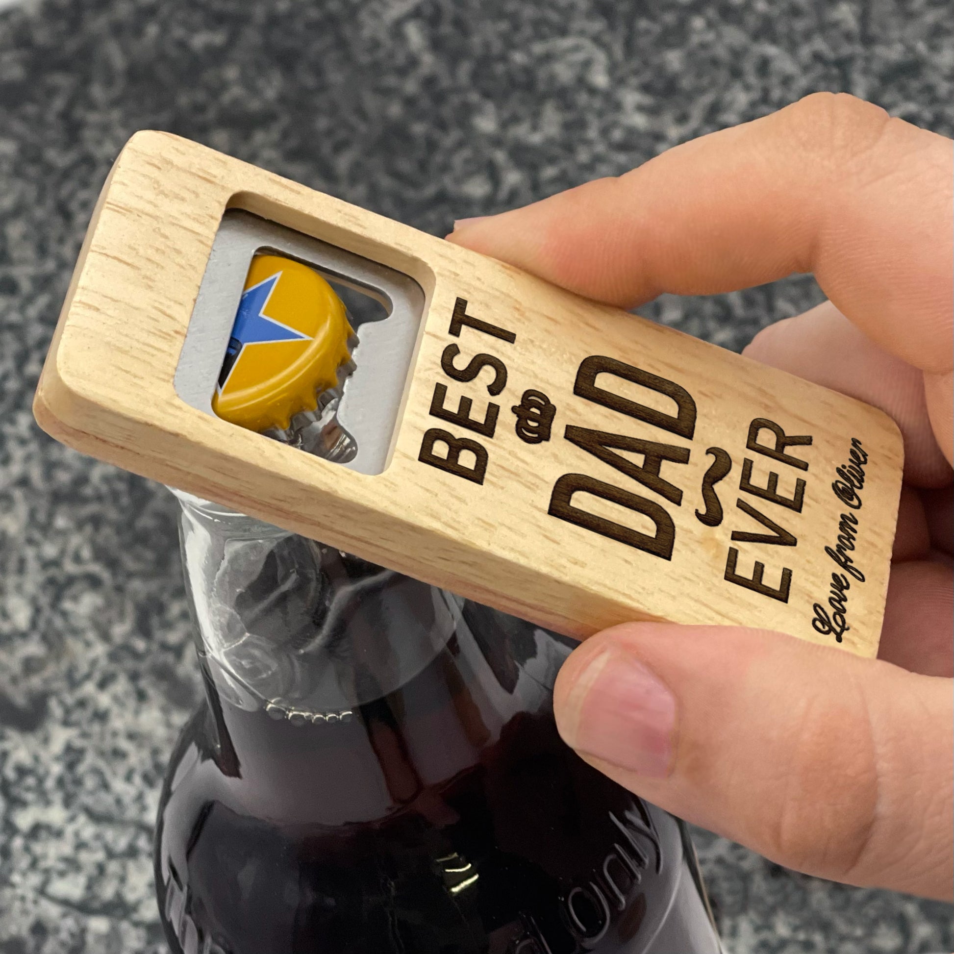 Father's Day Bottle Opener: Best Dad Ever. Pictured being used on a bottle of ale